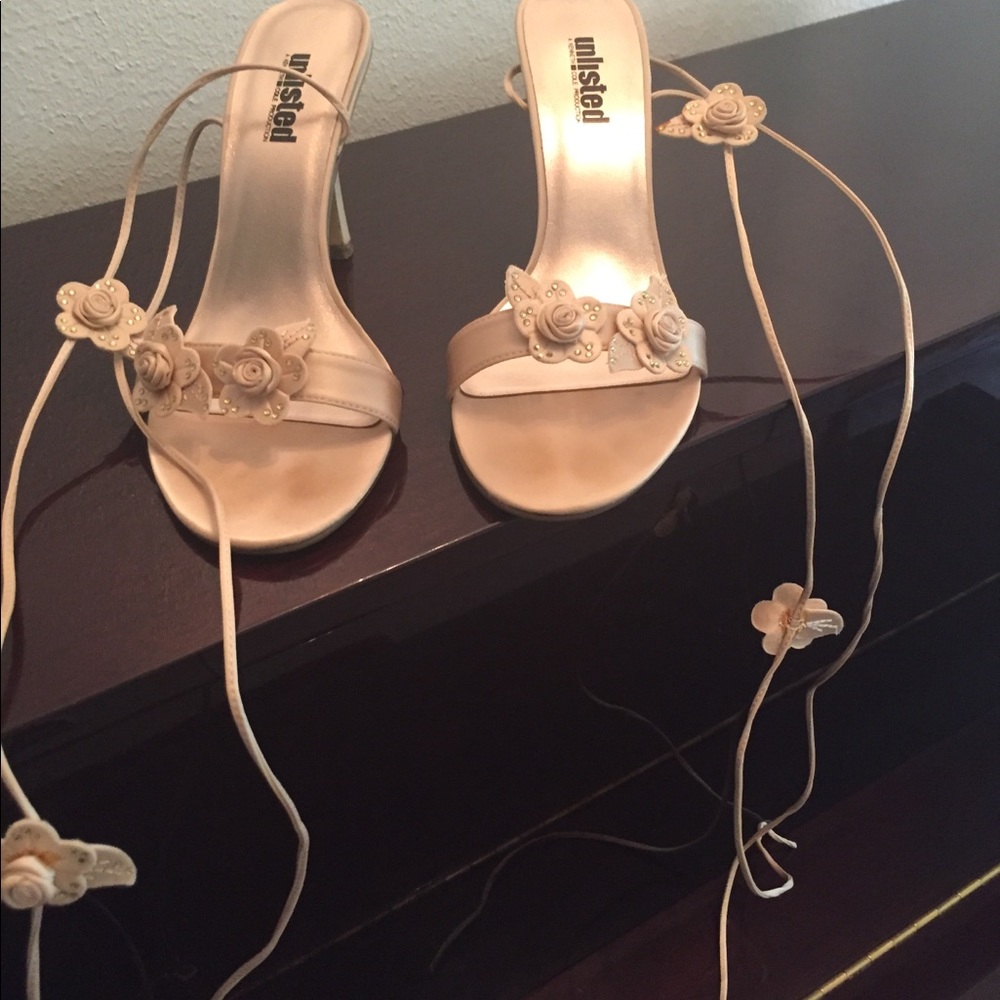 Satin beige tie up stilletoes with rose on ties